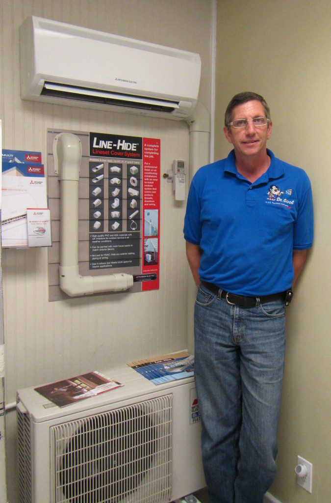Dr. Cool has been providing air conditioning service since 1999. Pictured here is Gary, General Manager of Dr. Cool with the Mitsubishi A/C display.