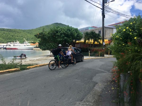 Two passengers from SeaDream 2 biked through town Sunday.